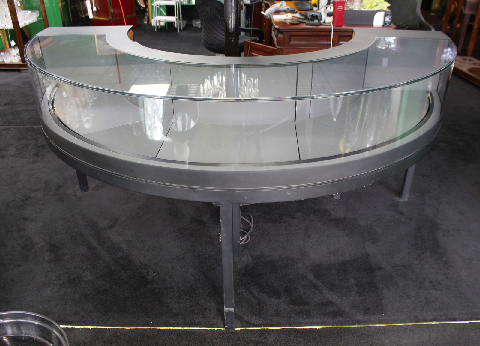 Georg Jensen Showroom Cabinet in Curved Glass and Ebonised Steel: Title: Georg Jensen Showroom Cabinet in Curved Glass and Ebonised Steel Description: Striking Georg Jensen Showroom Cabinet in Curved Glass and Ebonised Steel with Lockable Drawers A superbly