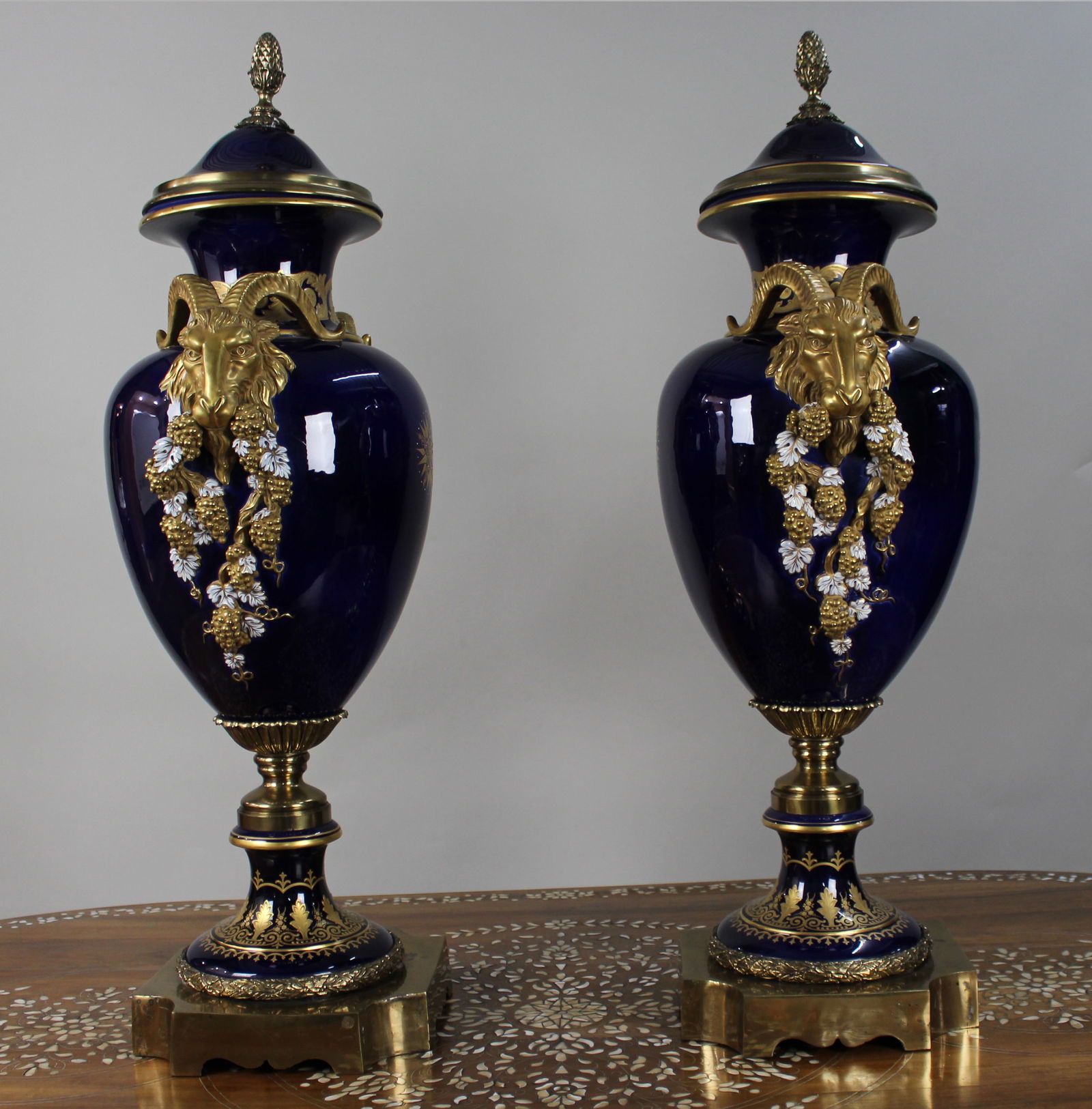 Pair of Fine Sevres Style Cobalt Blue Rams Head Lidded Urns - 18