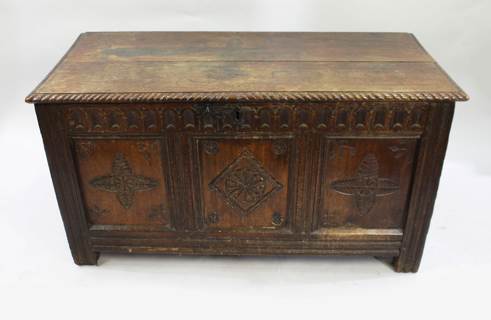 17th Century English Carved Oak Coffer with Foliate and Lozenge Panels: Title: 17th Century English Carved Oak Coffer with Foliate and Lozenge Panels Description: 17th Century English Carved Oak Coffer A good 17th century carved oak coffer of traditional f