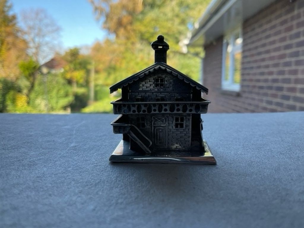 Rare Antique Dutch Silver Ski Chalet Miniature: Title: Rare Antique Dutch Silver Ski Chalet Miniature Description: Rare Antique Dutch Silver Miniature of a Ski Chalet. The lid is hinged and opens up to show a small storage