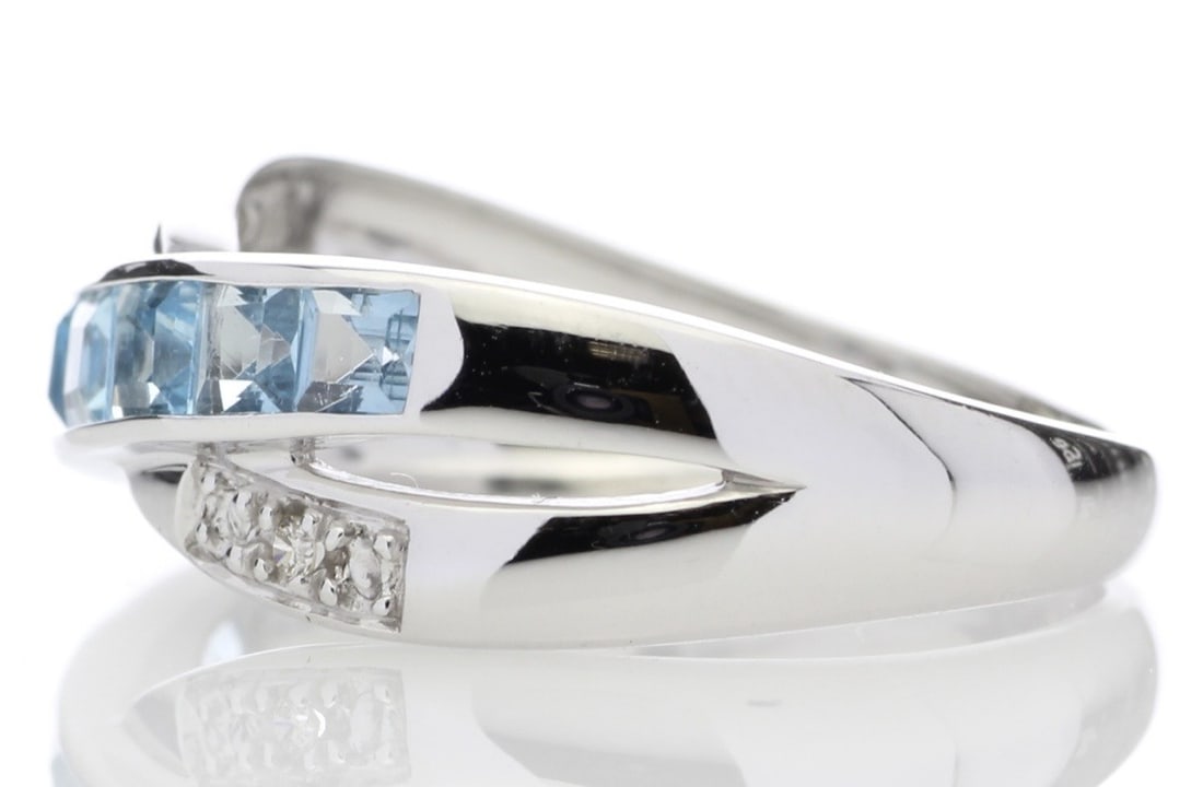 This Twist On A Classic Ring Is Stunning. Seven Beautiful Princess Cut Blue Topaz Gemstones - 5