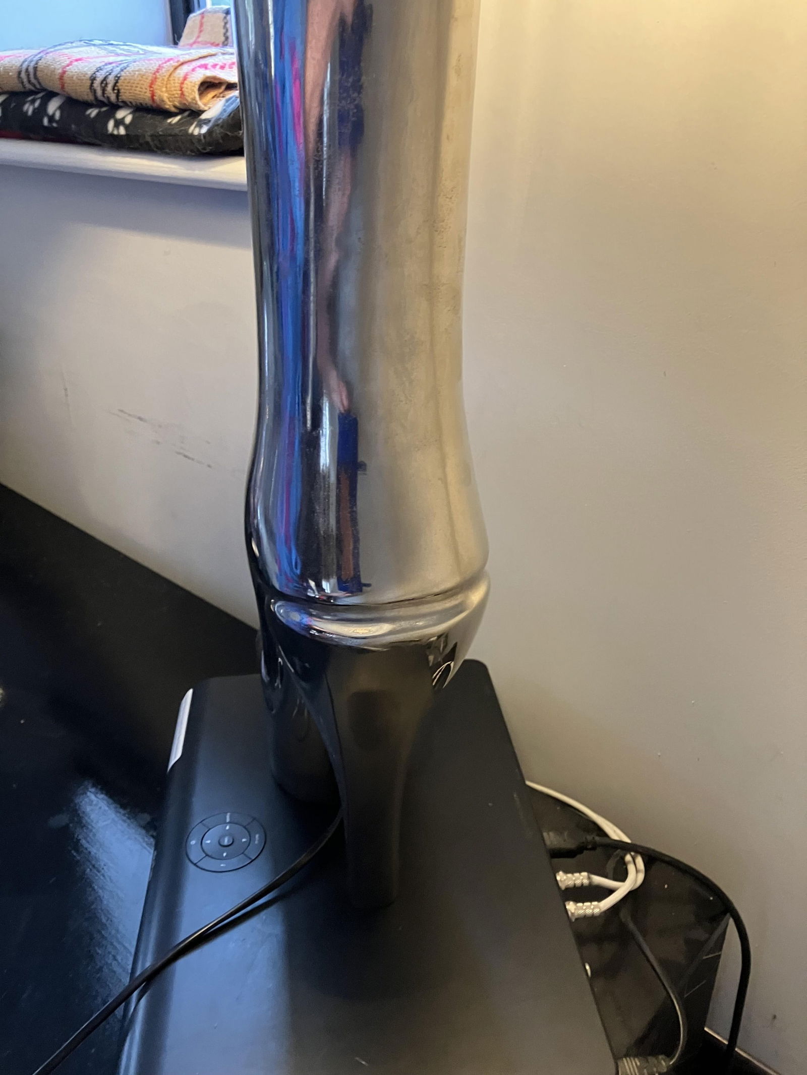 Boot Fashion Lamp: Title: Boot Fashion Lamp Description: Excellent condition. Purchased in the Netherlands hence plug. Perfect working order. Chrome chunky boot and black with a red rim shade. Plug will be