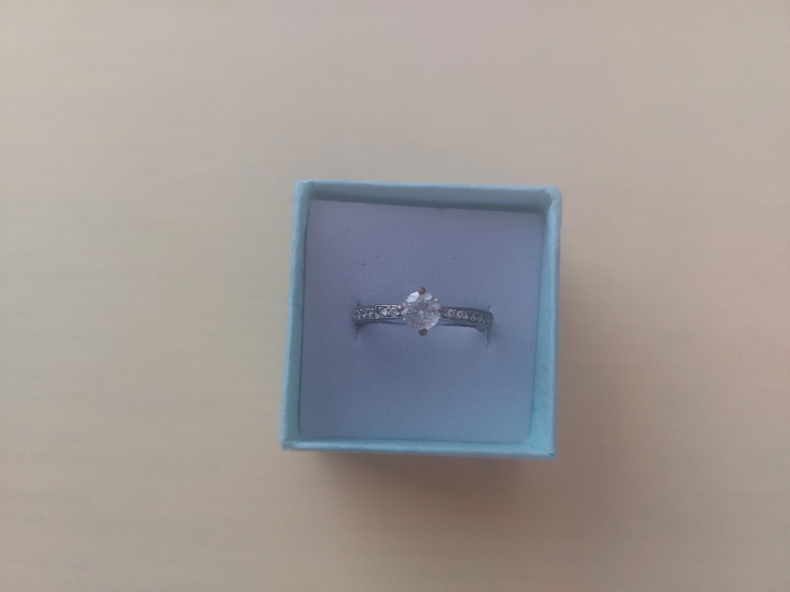 Dress Ring Size O: Title: Dress Ring Size O Description: Used dress ring Some signs of wear Classic style rhodium plated round brilliant cut cubiz zirconia solitaire claw set with individual stone approx 0.50