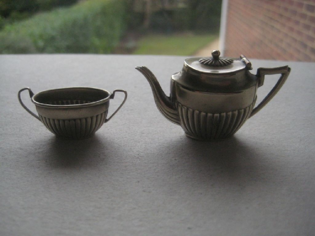 Antique Silver Plated EPNS Miniature Teapot and Sugar Bowl: Title: Antique Silver Plated EPNS Miniature Teapot and Sugar Bowl Description: Antique Silver Plated EPNS Miniature Teapot and Sugar Bowl. Dates to around 1920. Height of the