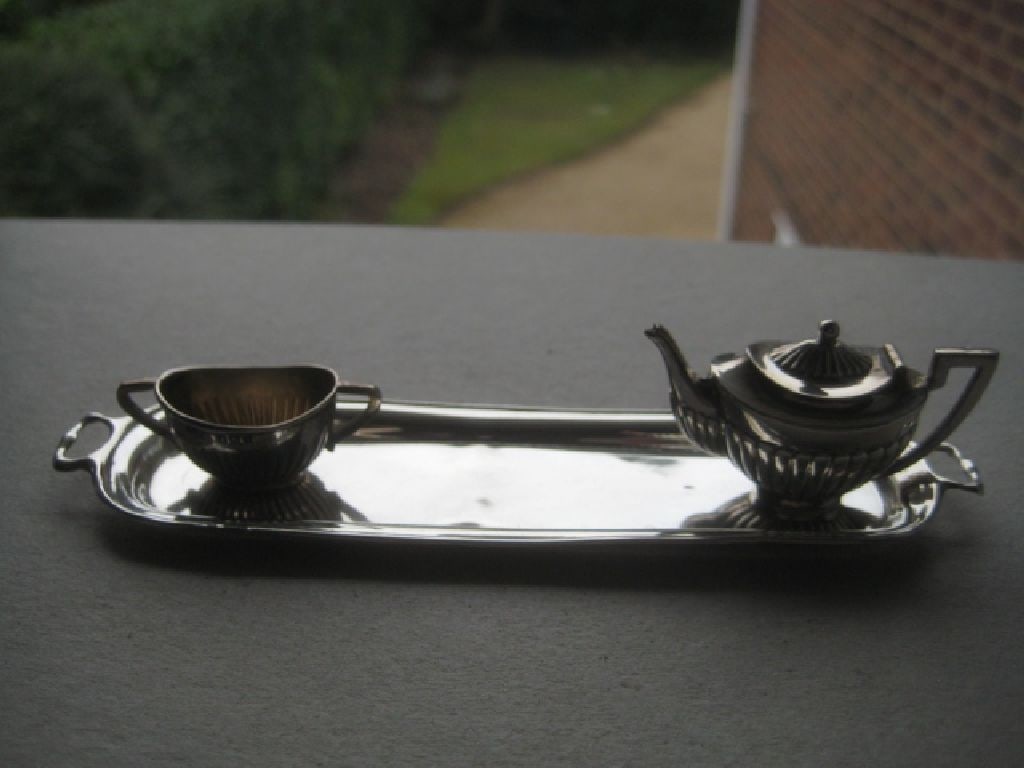 Antique Miniature Silver Teapot and Sugar Bowl, Tray Set: Title: Antique Miniature Silver Teapot and Sugar Bowl, Tray Set Description: Antique Miniature Silver Teapot and Sugar Bowl Set on Silver Tray. The Teapot is Hallmarked for