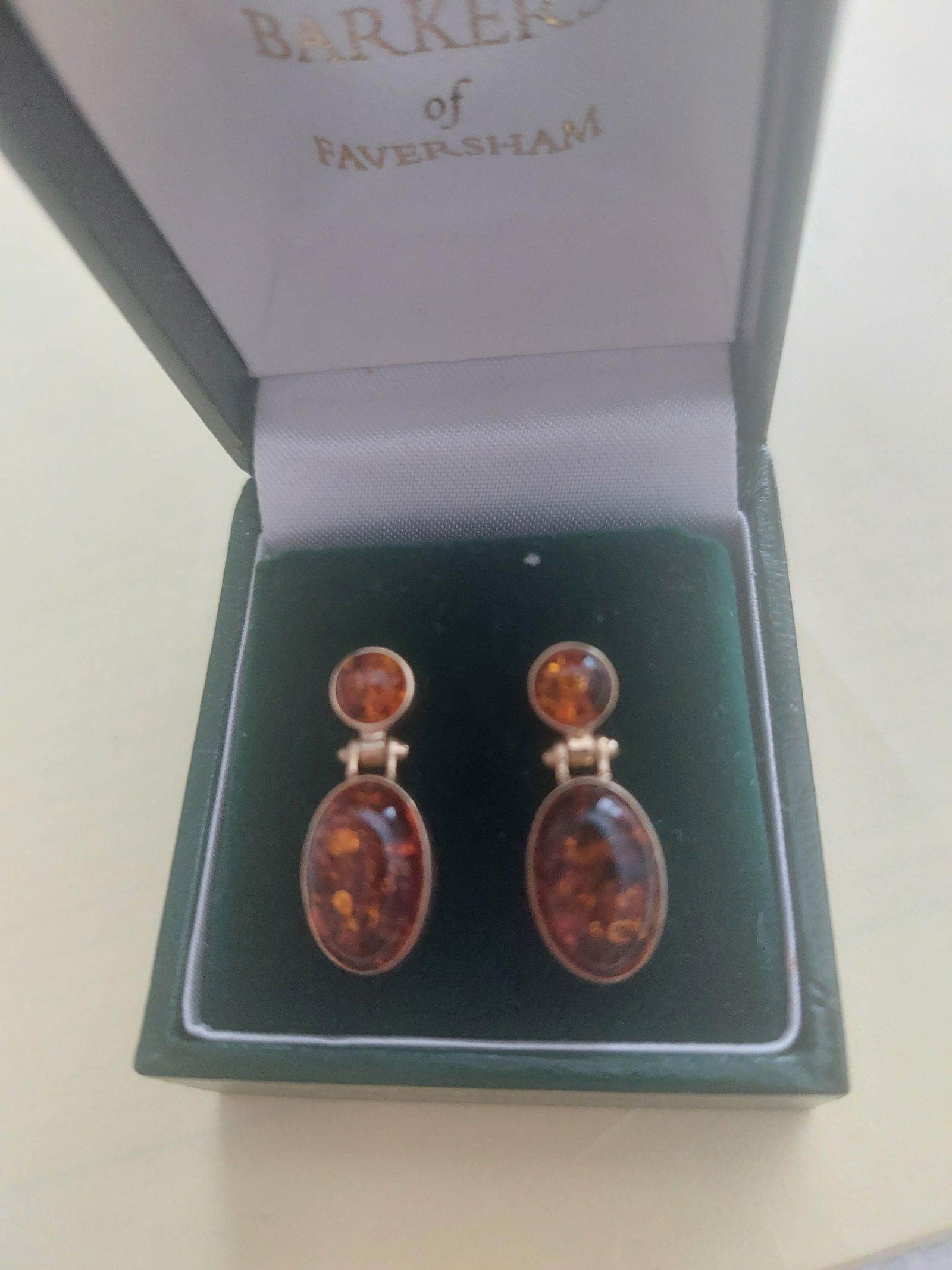 Gold and Amber Earrings: Title: Gold and Amber Earrings Description: Stunning 9 ct gold and amber stones earrings. Unworn Beautiful unusual stones Condition