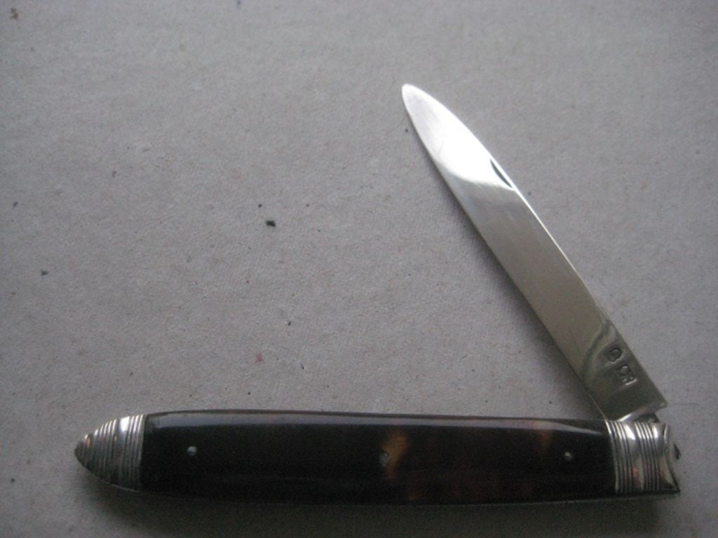 Antique George III Silver Folding Fruit Knife: Title: Antique George III Silver Folding Fruit Knife Description: Rare George III Silver Folding Fruit Knife. Dates to around 1800. Length Open in Inches is 6.25, and Closed is 3.55 Inches.