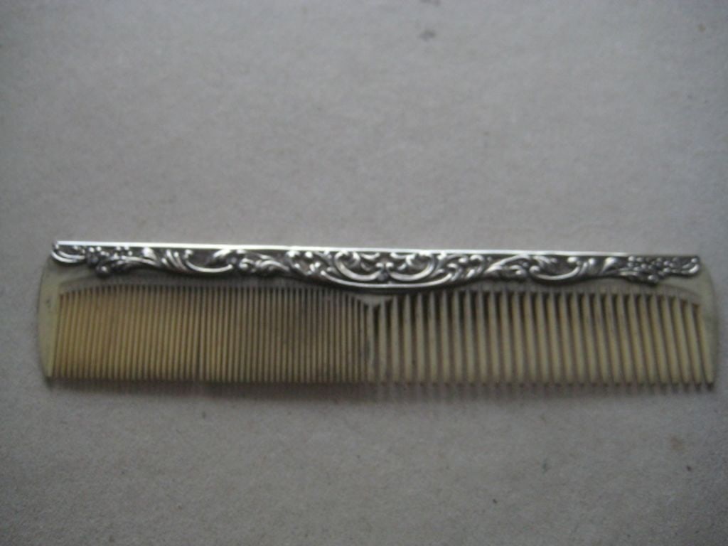 Vintage Silver Hafted Plastic Comb: Title: Vintage Silver Hafted Plastic Comb Description: Vintage Silver Hafted Plastic Comb. Hallmarked for Birmingham 1972, and made by W I Broadway & Co. Length in Inches