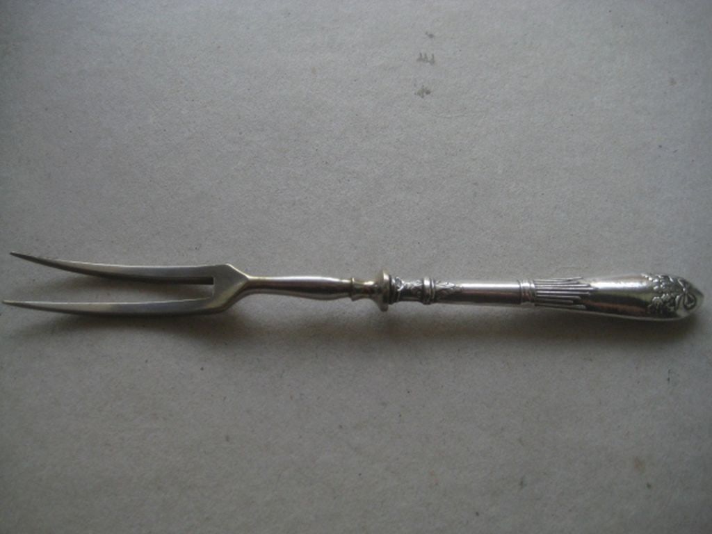 Antique Russian Silver Hafted Fork: Title: Antique Russian Silver Hafted Fork Description: Antique Russian Silver Hafted Fork. Hallmarked with the 875 Punch for Latvia. Length in Inches is