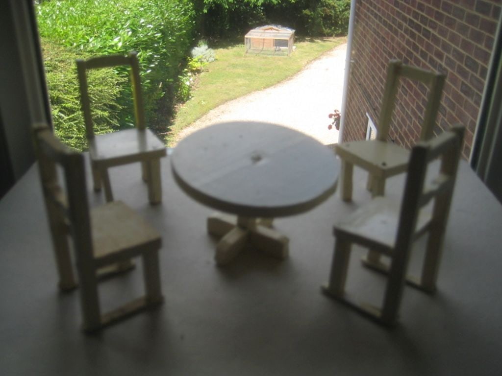 Vintage Dolls House Wooden Table and Four Chairs: Title: Vintage Dolls House Wooden Table and Four Chairs Description: Vintage Dolls House Wooden Table and Four Chairs. Height of a chair is 8cm. Height of the table is 5.5cm. 