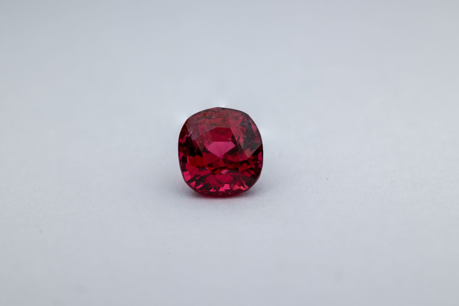 Spinel 0.86 Ct: Title: Spinel 0.86 Ct Description: Species: Natural Spinel Variety: Red Spinel Shape: Cushion Measurements: 5.33x5.06x4.24mm Colour: Red 