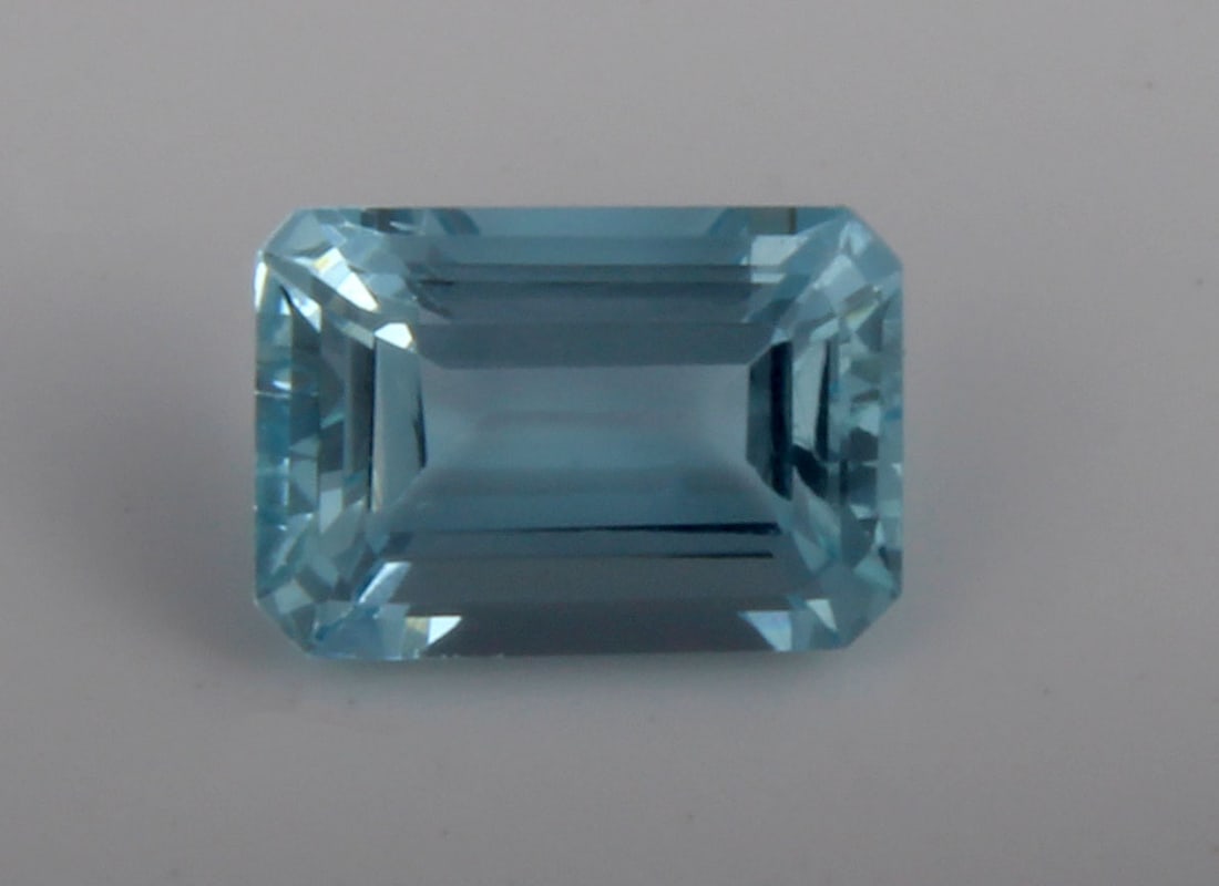 Aquamarine, 1.83 CT: Title: Aquamarine, 1.83 CT Description: Species: Beryl Variety: Aquamarine Shape: Emerald Cut Measurements: 8.79x6.17x4.52mm Colour: Blue Certificate: Yes (GSI/