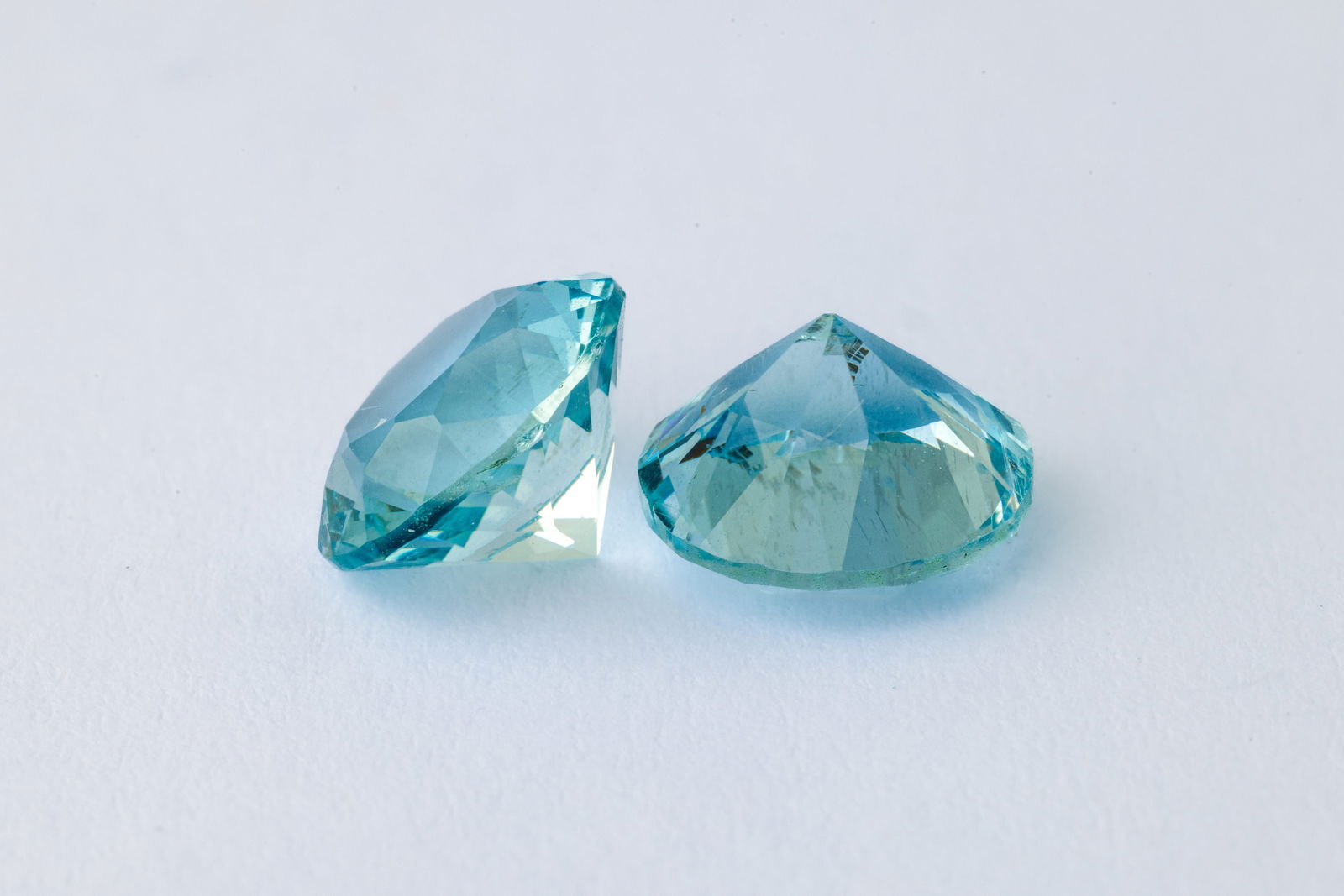 Aquamarines, 1.60 & 1.61Ct: Title: Aquamarines, 1.60 & 1.61Ct Description: Species: Beryl Variety: Aquamarine Shape: Round Brillant Cut Measurements: 7.8x5,15mm(2x) Colour: Blue 
