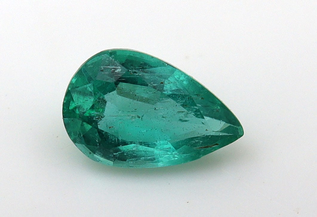 Emerald 1.03 Ct: Title: Emerald 1.03 Ct Description: Species: Beryl Variety: Emerald Shape: Rect. Cushion Measurements: 6.35x8.30x4.28mm Colour: Green Cer