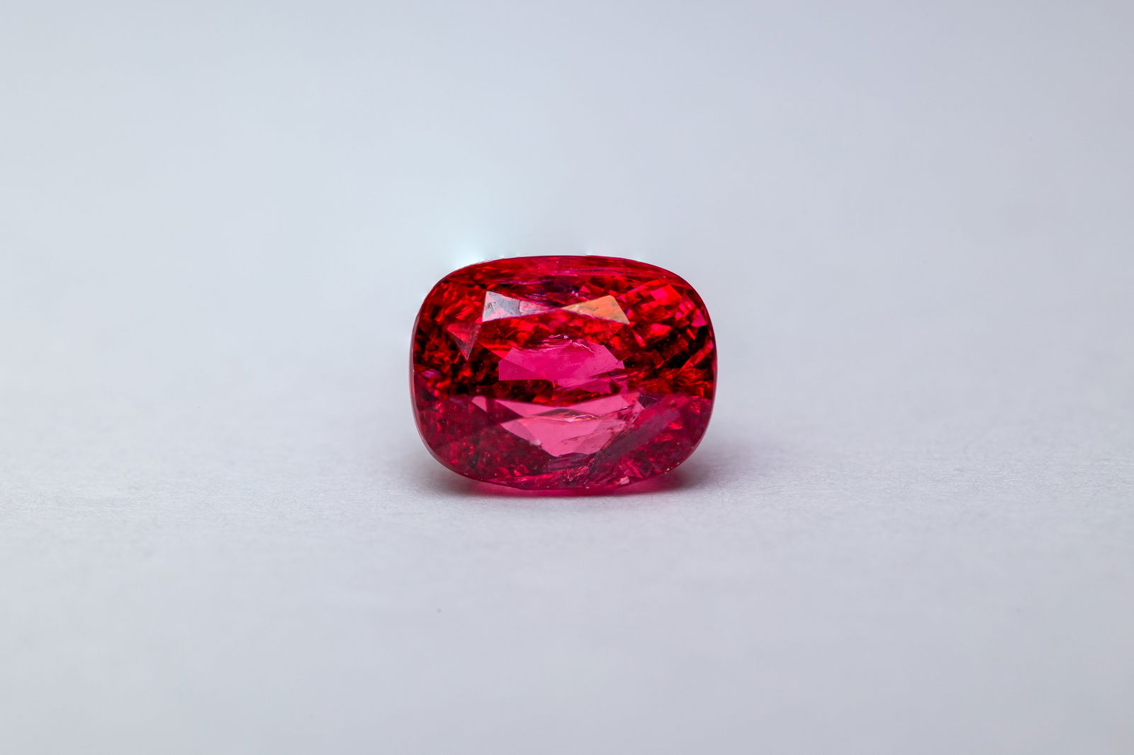 Spinel 1.04 Ct: Title: Spinel 1.04 Ct Description: Species: Natural Spinel Variety: Red Spinel Shape: Rectangular Cushion Measurements: 6.11x4.67x4.44mm Colour: Pinkish Red 
