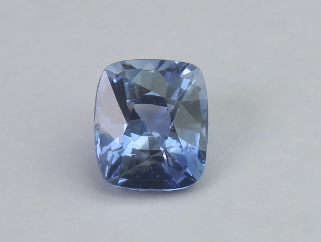 Blue Sapphire 1.32 T: Title: Blue Sapphire 1.32 T Description: Species: Corundum Variety: Sapphire Shape: Cushion mixed Cut Measurements:6.39x5.57x4.04mm Colour: Blue Certificate: