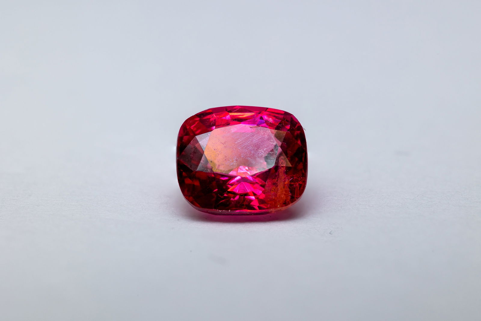 Spinel 1.08 Ct: Title: Spinel 1.08 Ct Description: Species: Natural Spinel Variety: Red Spinel Shape: Cushion Measurements: 5.80x6.11x3.71mm Colour: Pinkish Red Comment: