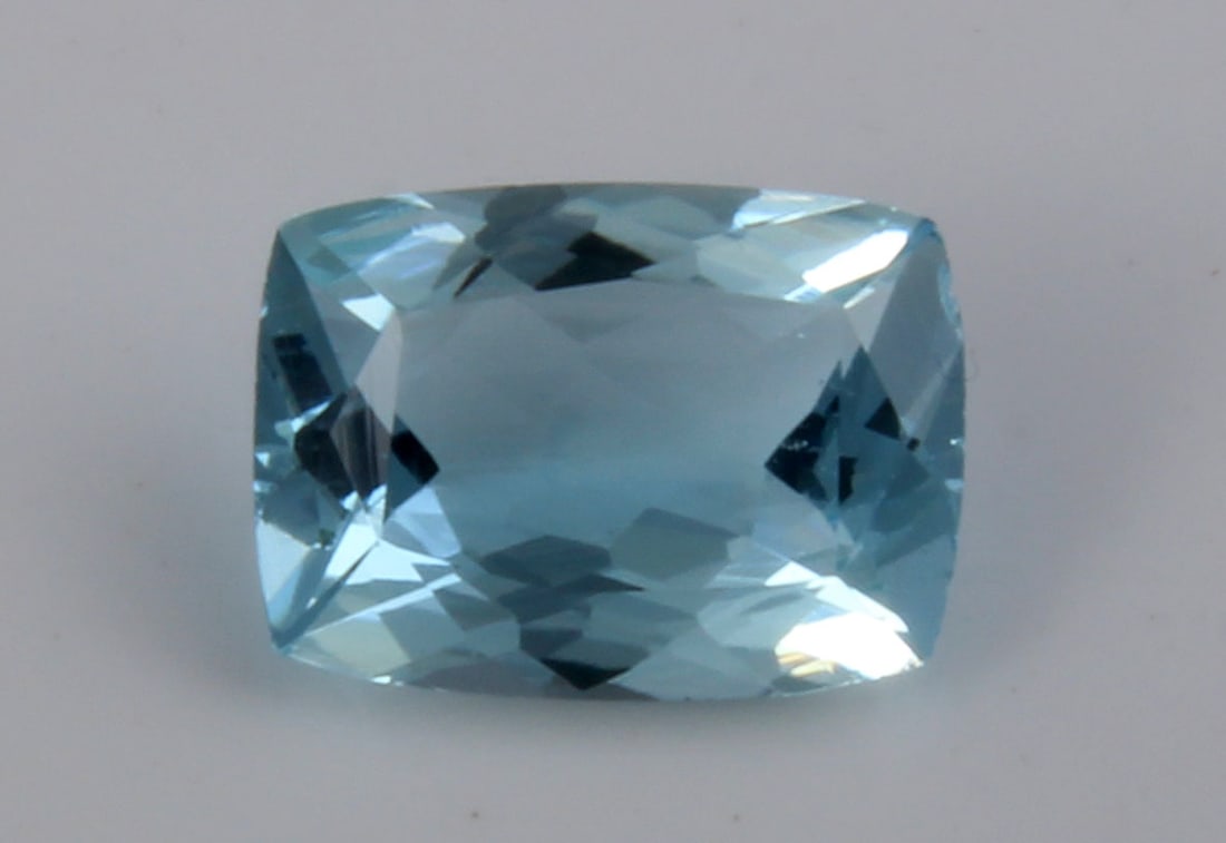 Aquamarine, 1.39 Ct: Title: Aquamarine, 1.39 Ct Description: Species: Beryl Variety: Aquamarine Shape: Cushion Measurements: 9.14x6.67x3.50mm Colour: Blue Certificate: Yes (GSI/