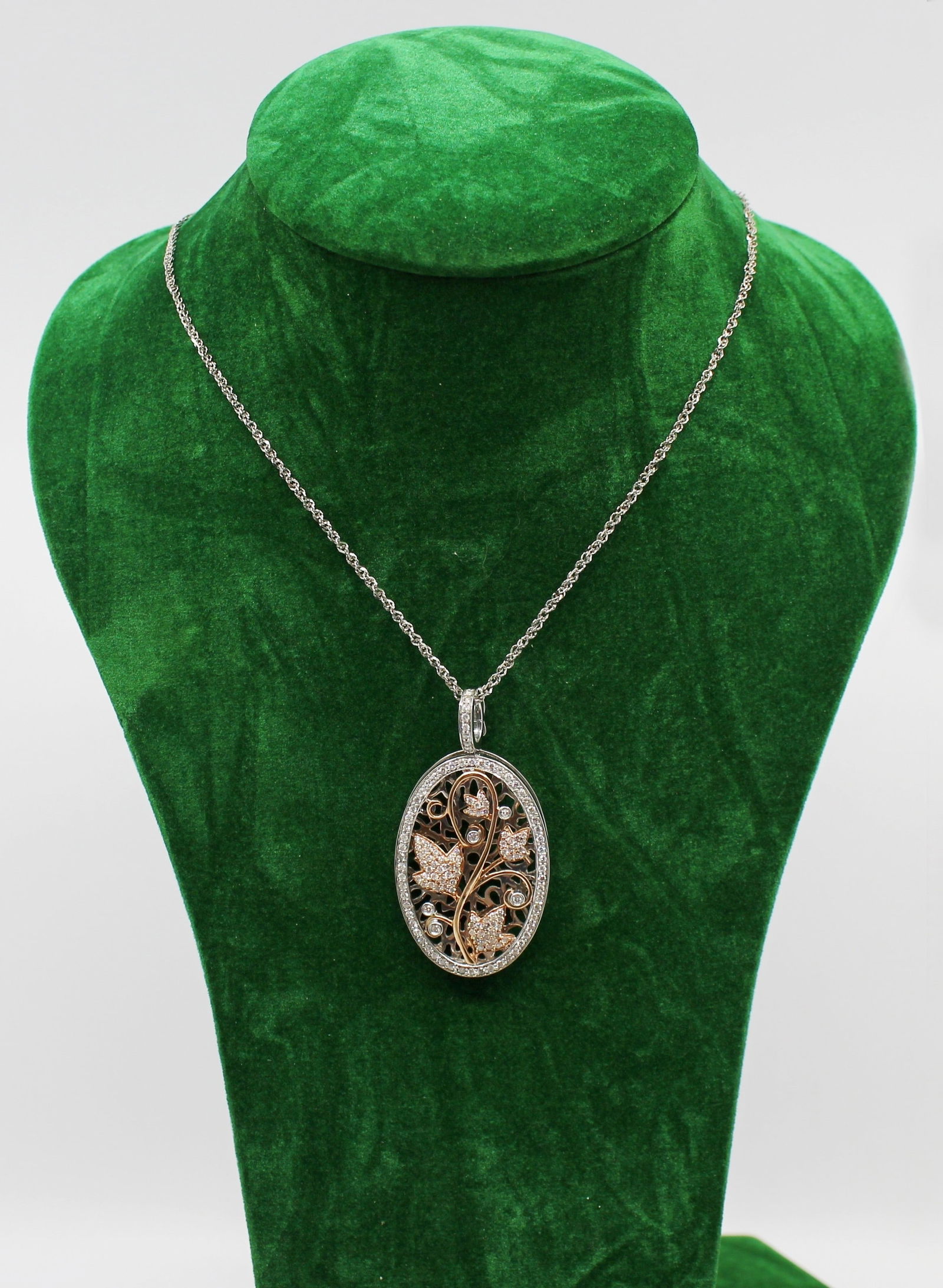 Diamond & 14ct Gold Oval Locket on Chain: Title: Diamond & 14ct Gold Oval Locket on Chain Description: Diamond & 14ct Gold Oval Locket on Chain Late 20th Century A stunning diamond-set oval locket crafted in a combination of