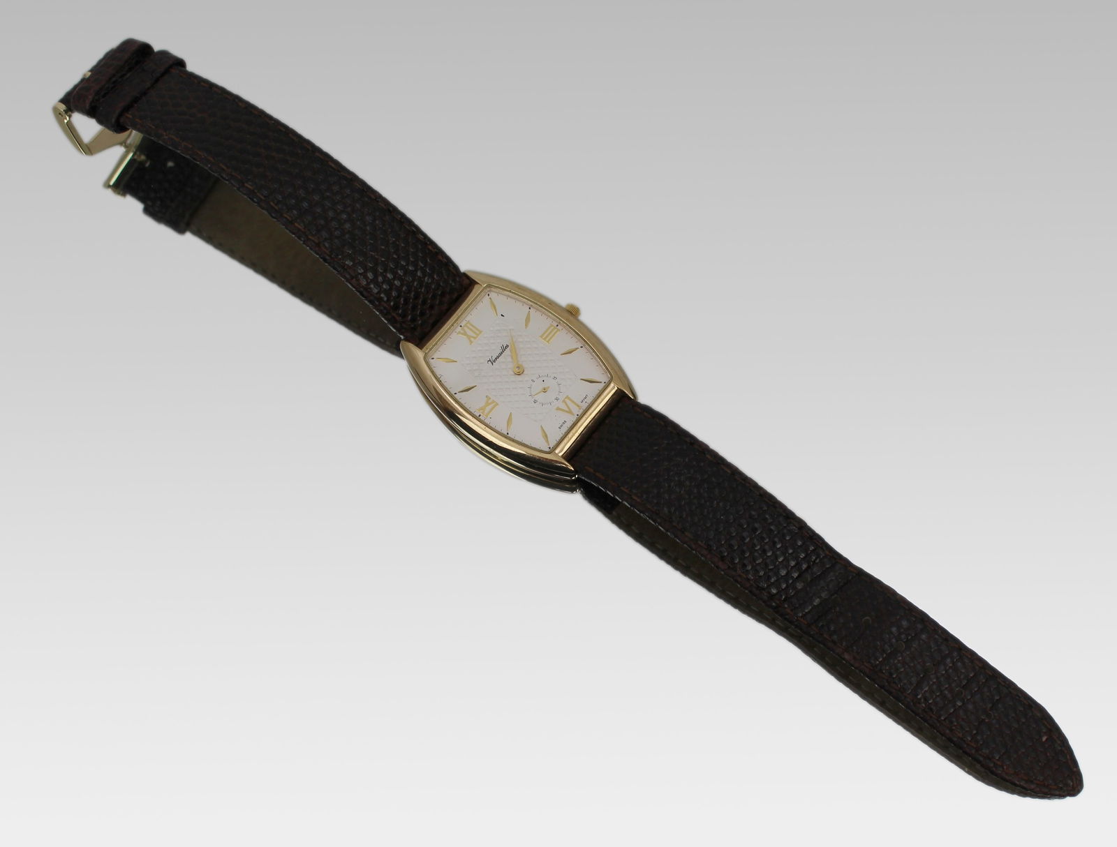 Versailles 9ct Gold Wristwatch: Title: Versailles 9ct Gold Wristwatch Description: Versailles 9ct Gold Wristwatch – London 1990, Swiss Quartz Movement A fine and stylish vintage Versailles gentleman’s wristwatch,