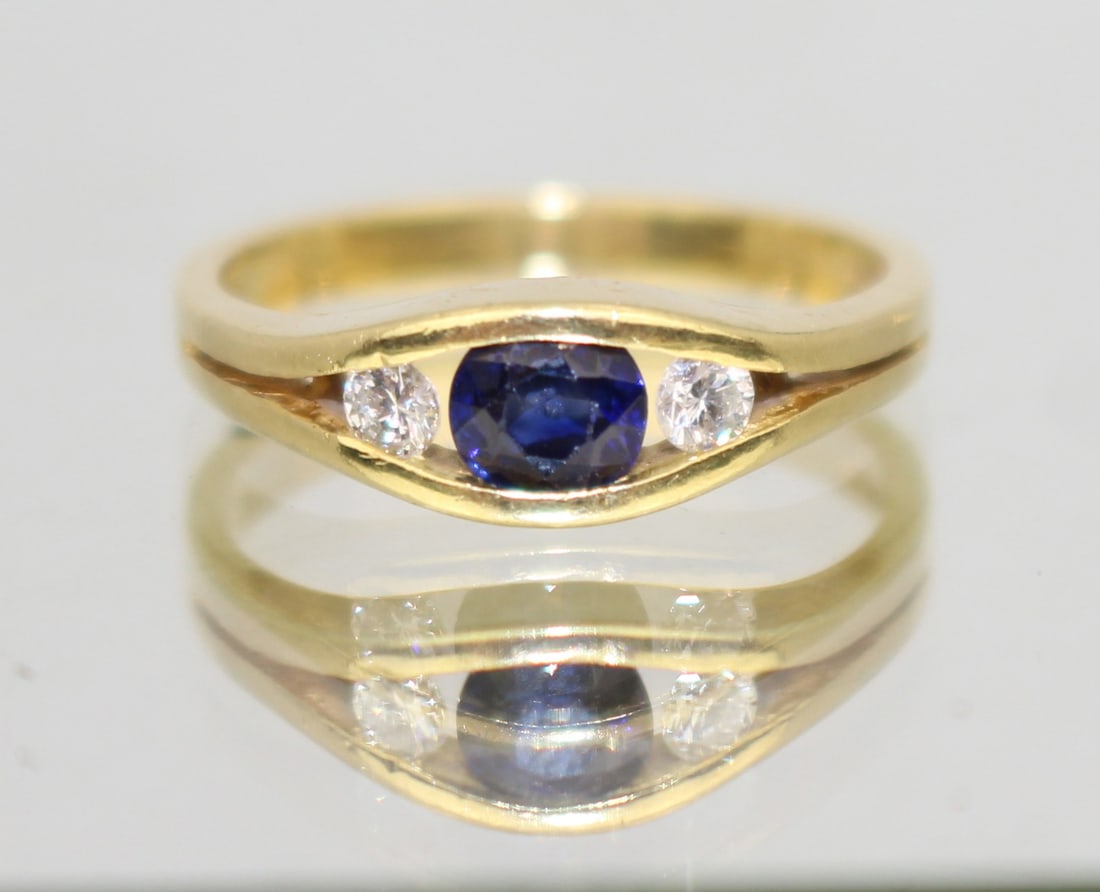 Three Stone Sapphire & Diamond 18ct Gold Ring: Title: Three Stone Sapphire & Diamond 18ct Gold Ring Description: Vintage Three Stone Sapphire & Diamond 18ct Gold Ring Vintage, 20th c. Sapphires & diamonds, 18ct yellow gold. 