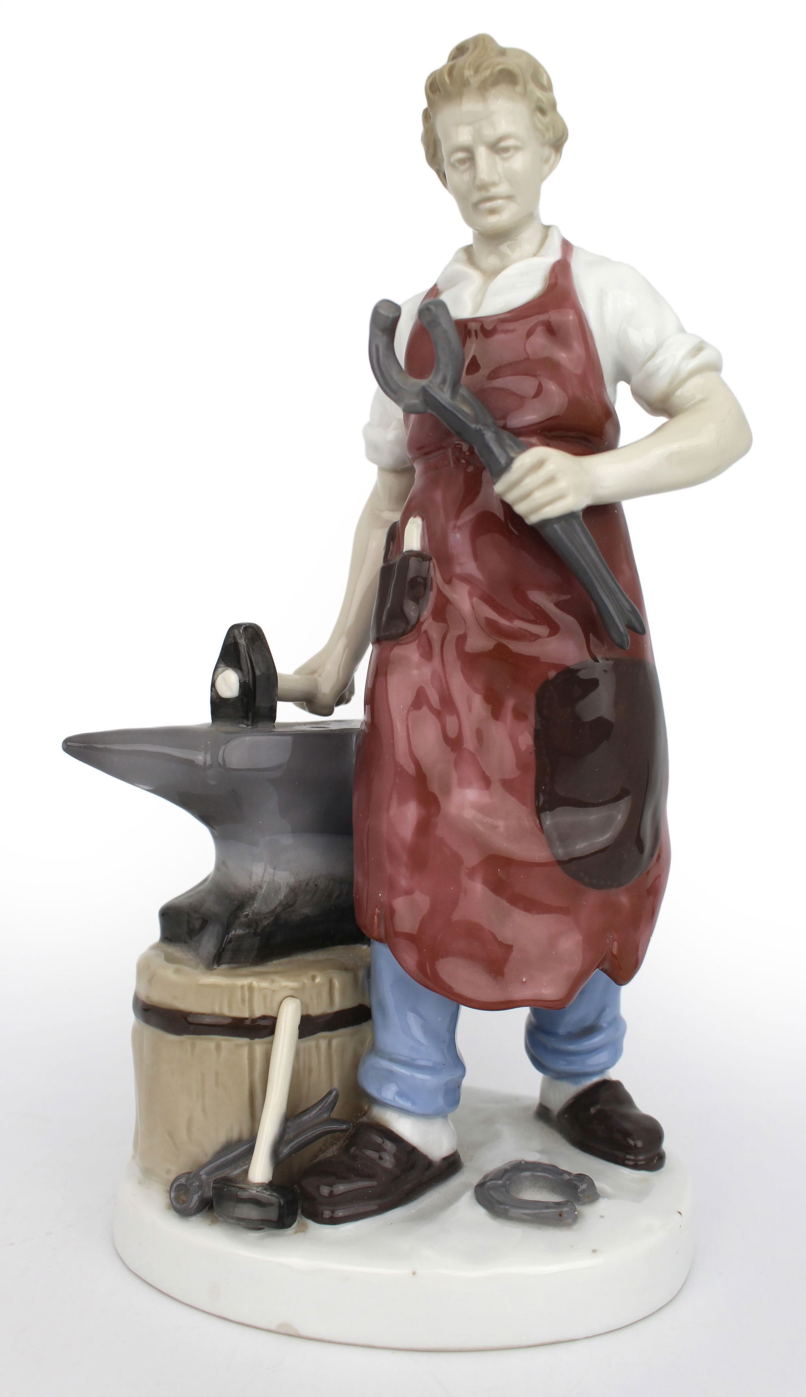 Vintage German Grafenthal Carl Scheidig Porcelain Blacksmith Figurine: Title: Vintage German Grafenthal Carl Scheidig Porcelain Blacksmith Figurine Description: Vintage German Grafenthal Carl Scheidig Porcelain Blacksmith Figurine German, mid 20th c. Measures 13