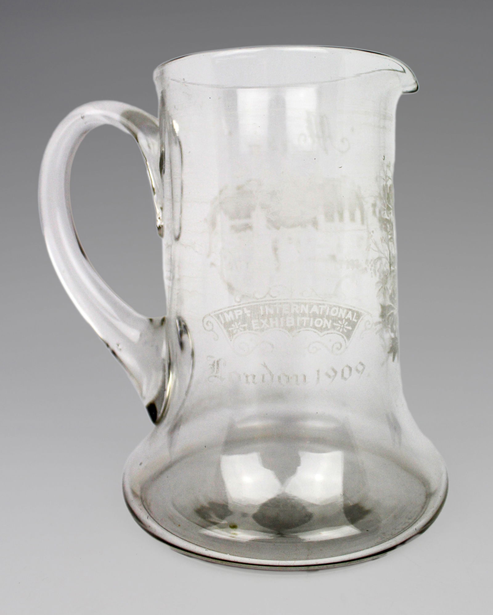 Edwardian Imperial International Exhibition London Glass Tankard: Title: Edwardian Imperial International Exhibition London Glass Tankard Description: Edwardian Commemorative Glass Tankard – Imperial International Exhibition London 1909 A good original