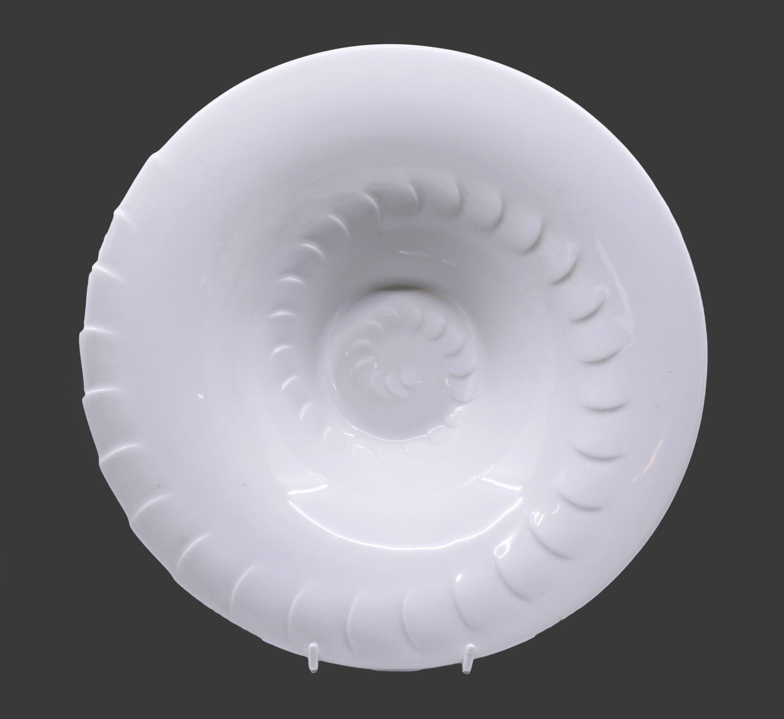 Royal Worcester Bowl Last Factory Piece: Title: Royal Worcester Bowl Last Factory Piece Description: Item: White porcelain bowl on a raised foot Design: Spiral shell-like moulded pattern, elegantly minimal in pure white Backstamp: 