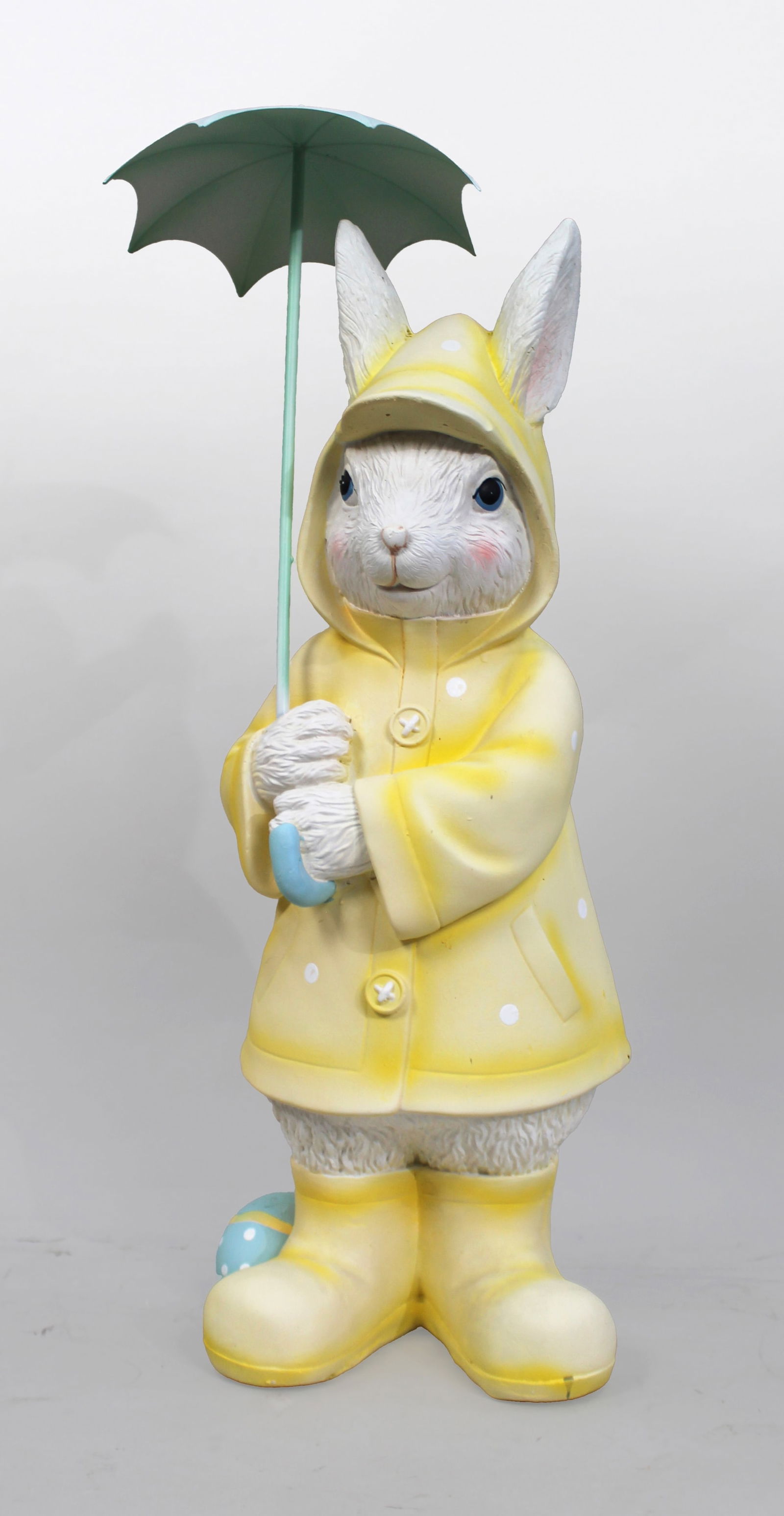 Decorative Easter Bunny with Umbrella: Title: Decorative Easter Bunny with Umbrella Description: Decorative Easter Bunny with Umbrella Composite with the umbrella in metal. Hand painted finish. Measures 26 x 26 x 82 (height) cm 