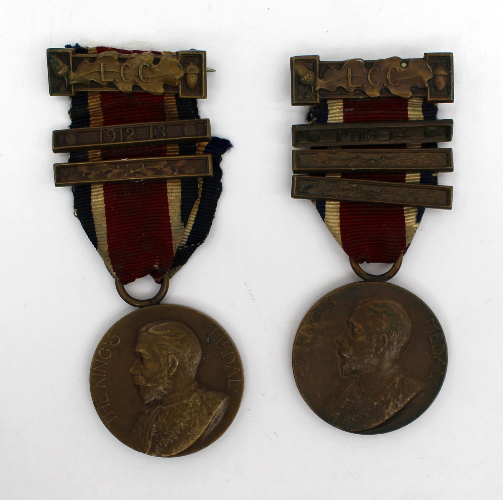 Pair of L.C.C. King’s Medals for Attendance, Conduct & Industry: Title: Pair of L.C.C. King’s Medals for Attendance, Conduct & Industry Description: Pair of L.C.C. King’s Medals for Attendance, Conduct & Industry – 1912–13