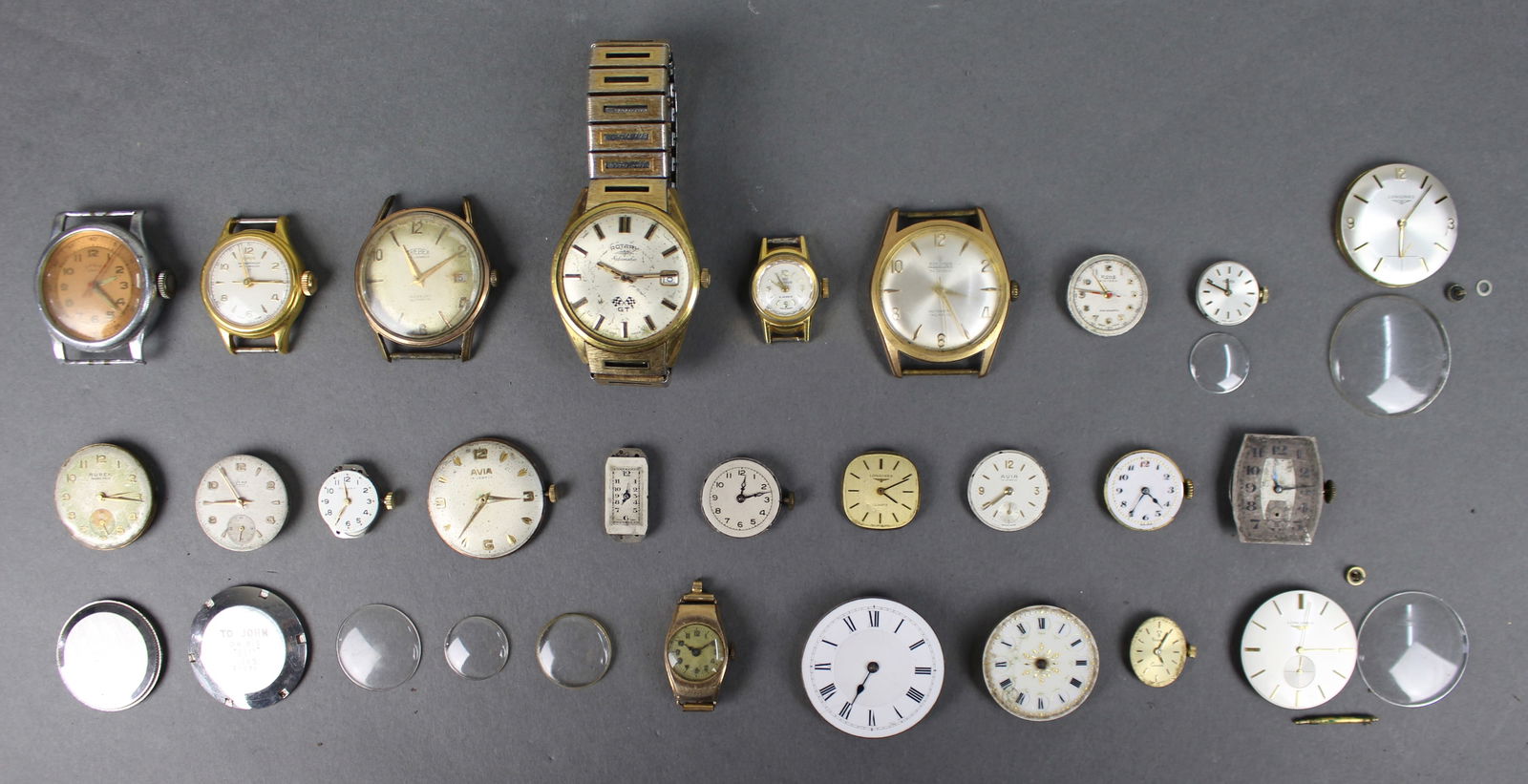 Collection of Antique & Vintage Watch Movements Parts: Title: Collection of Antique & Vintage Watch Movements Parts Description: Collection of Antique & Vintage Watch Movements Parts. All pictured; 24 movements. Including Rotary, Longines,