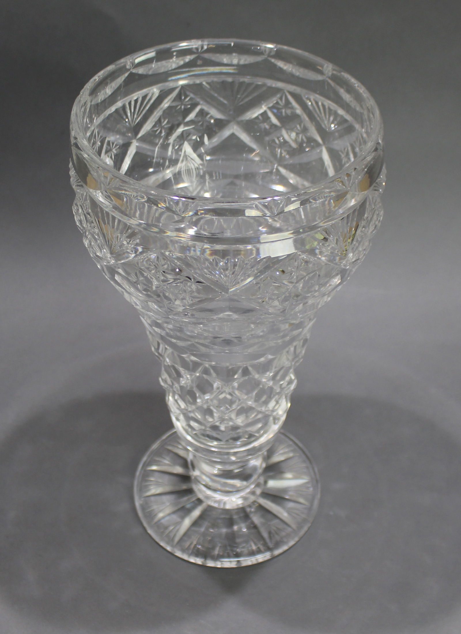 Mid 20th c. Large English Cut Glass Footed Vase: Title: Mid 20th c. Large English Cut Glass Footed Vase Description: 20th century. Made in Stourbridge. Heavy and beautifully cut. Width: 17 cm. Height: 31 cm. Good condition. Small nibble to