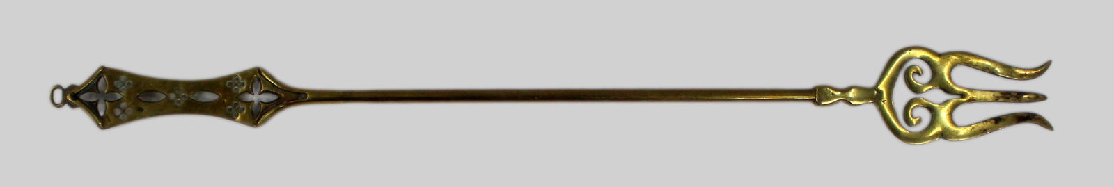 Antique Toasting Fork: Title: Antique Toasting Fork Description: Late Victorian Pierced Brass Toasting Fork A decorative pierced brass toasting fork dating to the late 19th or early 20th century. The trident-shaped