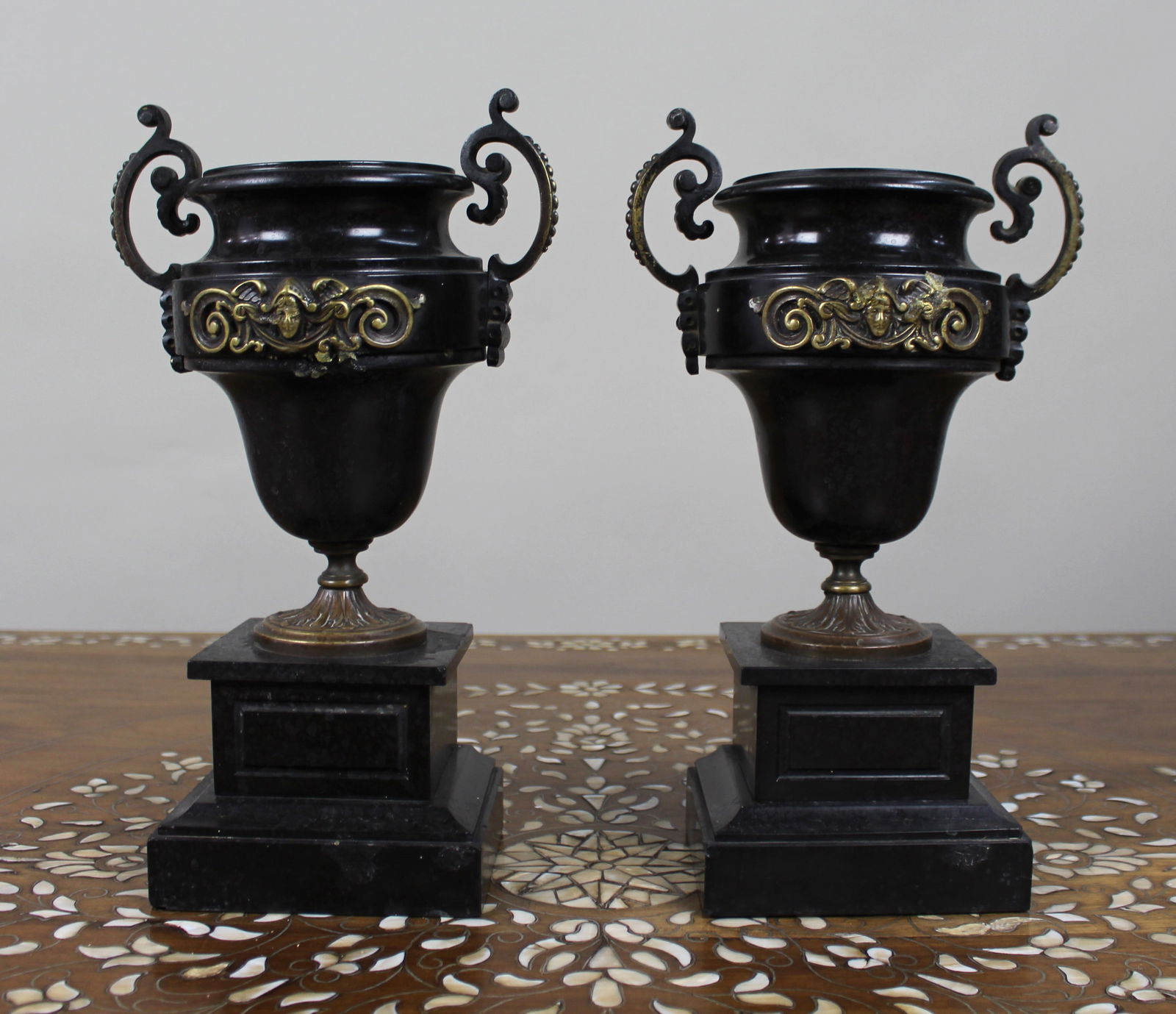 Pair of French Bronze and Marble Urns: Title: Pair of French Bronze and Marble Urns Description: Pair of French Bronze and Marble Urns France, circa 1870 A decorative pair of 19th-century French urns in the neoclassical style,