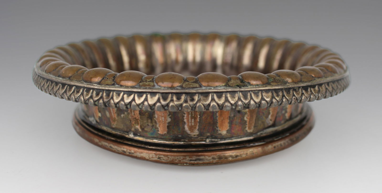 Antique Sheffield Plated Turned Wooden Wine Coaster: Title: Antique Sheffield Plated Turned Wooden Wine Coaster Description: Antique Sheffield Plated Turned Wooden Wine Coaster This antique wine coaster features a Sheffield plated metal rim and a