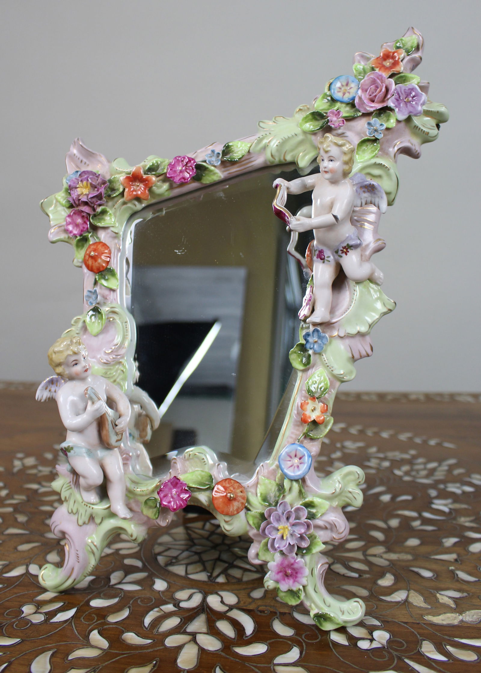 Vintage Dresden Porcelain Vanity Mirror: Title: Vintage Dresden Porcelain Vanity Mirror Description: Vintage Dresden Porcelain Vanity Mirror Mid/late 20th century. German Porcelain frame with floral encrusted deco