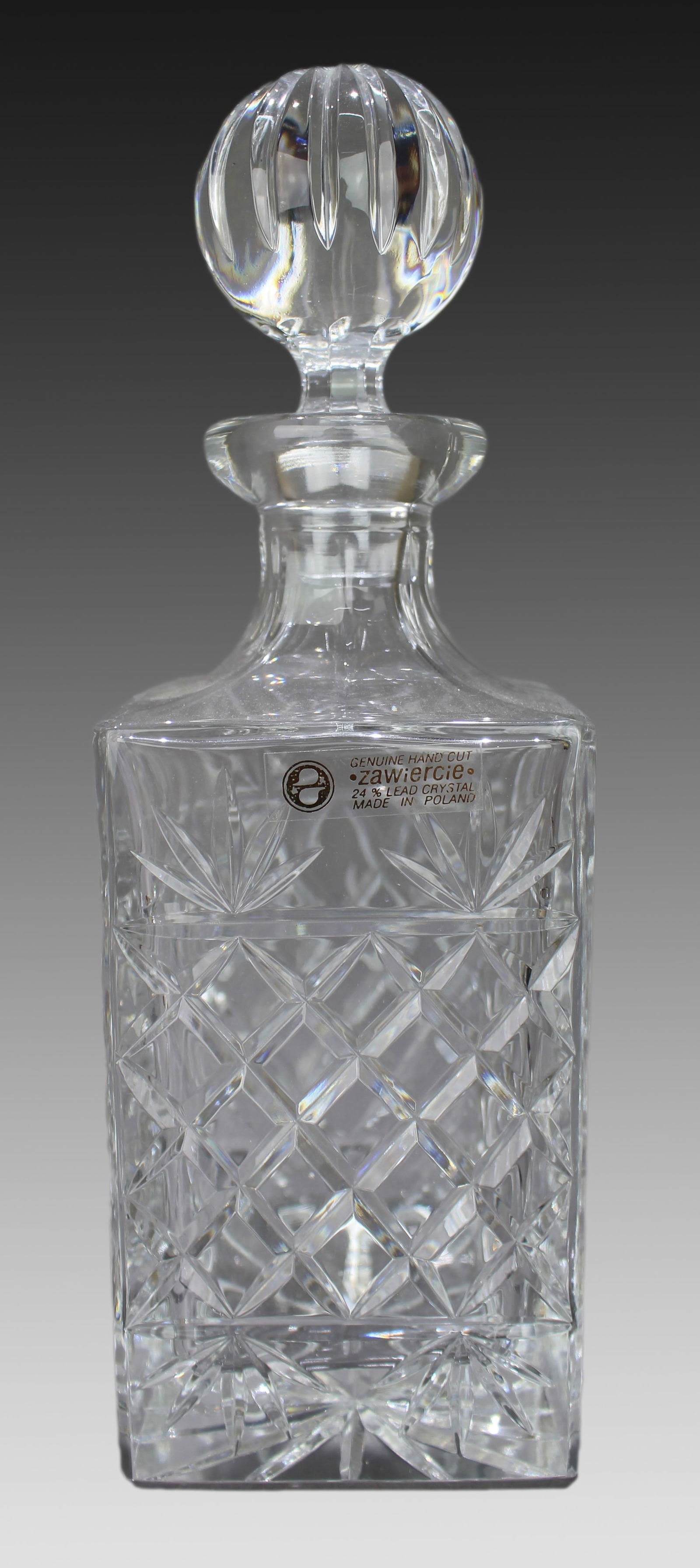 Vintage Zawiercie Polish Crystal Square Shaped Spirit Decanter: Title: Vintage Zawiercie Polish Crystal Square Shaped Spirit Decanter Description: Vintage Zawiercie Polish Crystal Square Shaped Spirit Decanter Factory label to decanter. Measures 9 x 9 x