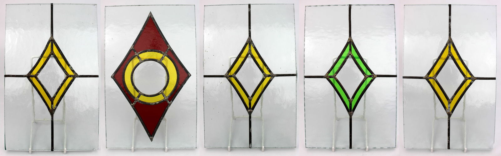 Set of 5 Vintage Stained Glass Panels: Title: Set of 5 Vintage Stained Glass Panels Description: Set of 5 Vintage Stained Glass Panels Stained glass with lead. Each measure 19 x 30 cm. Good condition; a few small nibbles and slight