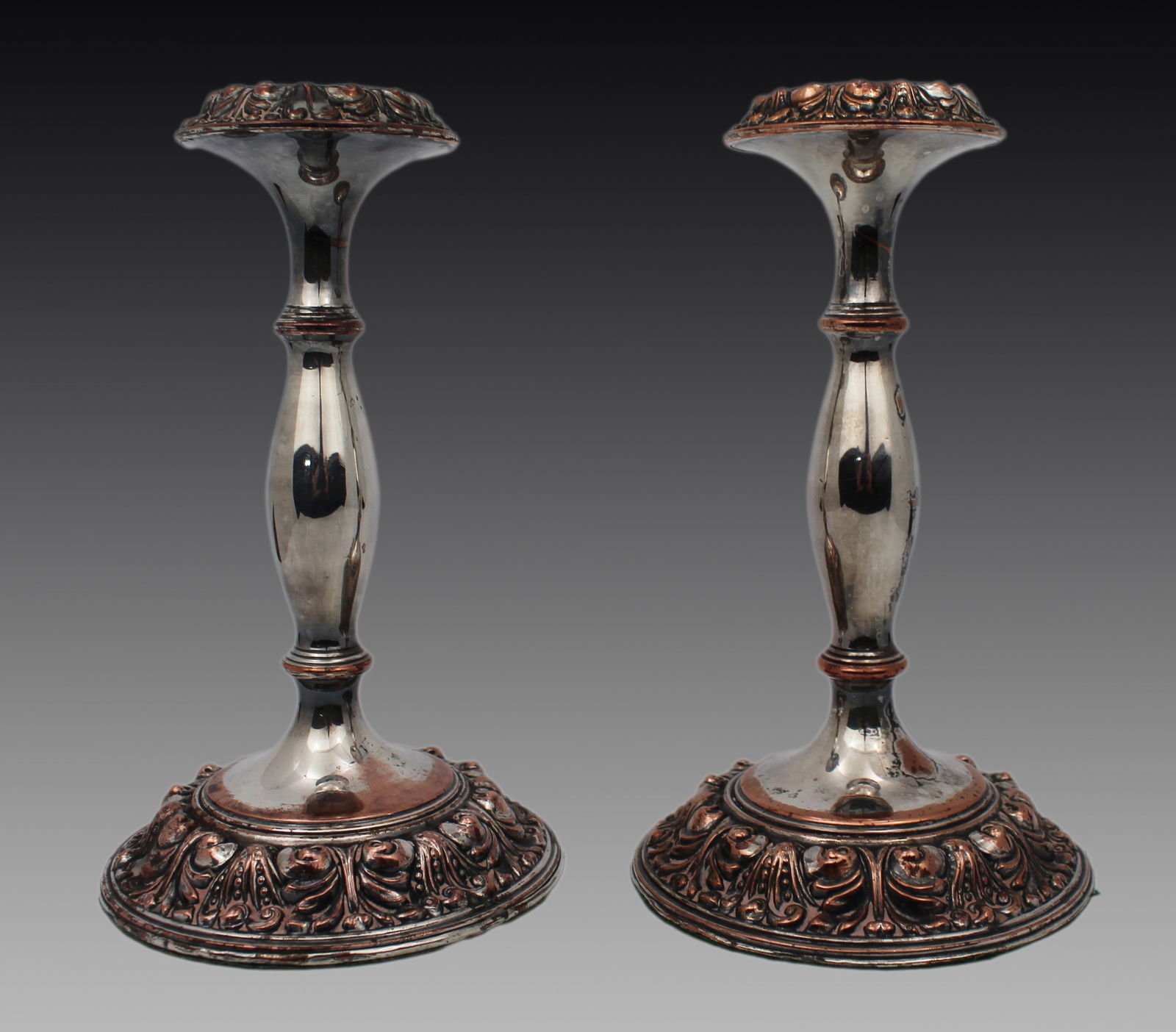 Pair of Antique Sheffield Plate Candlesticks: Title: Pair of Antique Sheffield Plate Candlesticks Description: Pair of Antique Sheffield Plate Candlesticks A good pair of 19th-century Sheffield plate candlesticks, of classic baluster form