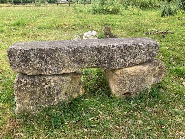 Stone Garden Bench: Title: Stone Garden Bench Description: Heavy stone garden bench. Very heavy as solid stone. Length: 112 cm Height: 54 cm Seat width: 32 cm Please note as an outside item it does have moss on