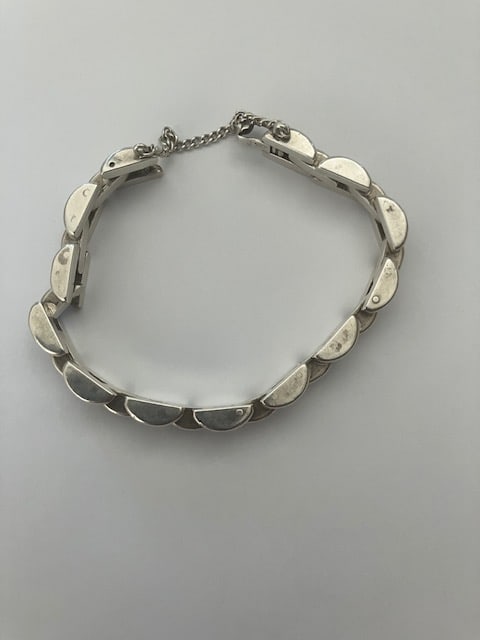 Sterling Silver Bracelet: Title: Sterling Silver Bracelet Description: Pre owned used condition. Hallmarked looks like 920. 8 inches in length. Please view image. Clasp does not work that well. Condition: Used Delivery