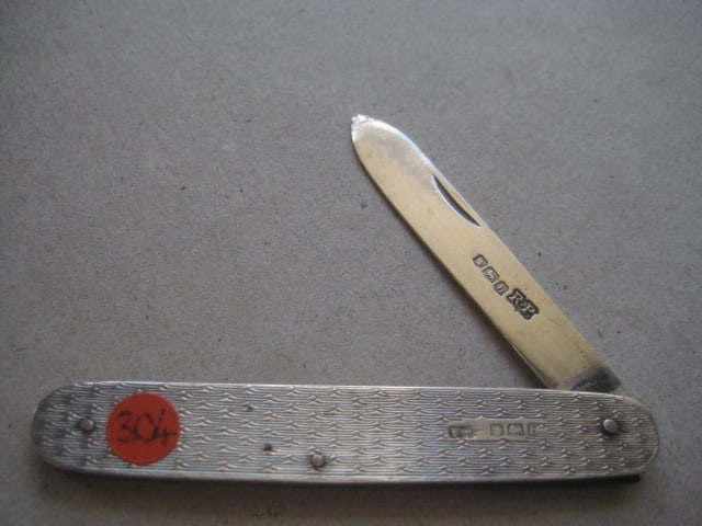 George V All Silver Folding Fruit Knife, Sheffield 1925: Title: George V All Silver Folding Fruit Knife, Sheffield 1925 Description: George V All Silver Folding Fruit Knife. The handle is decorated with an engine turned pattern. 