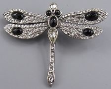 Vintage Signed MMA Dragonfly Brooch Rhinestone Dragonfly Brooch Pendant: Title: Vintage Signed MMA Dragonfly Brooch Rhinestone Dragonfly Brooch Pendant Description: Vintage MMA Brooch/ pendant Signed at the back One stone at the bottom of the tail missing.