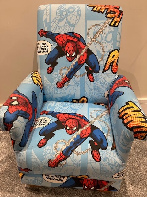 Spiderman Bespoke Child's Chair: Title: Spiderman Bespoke Child's Chair Description: Very good condition.Slight marks on one armrest as shown. Excellent finish and quality. Wood feet. Bespoke item made for a christening but now too