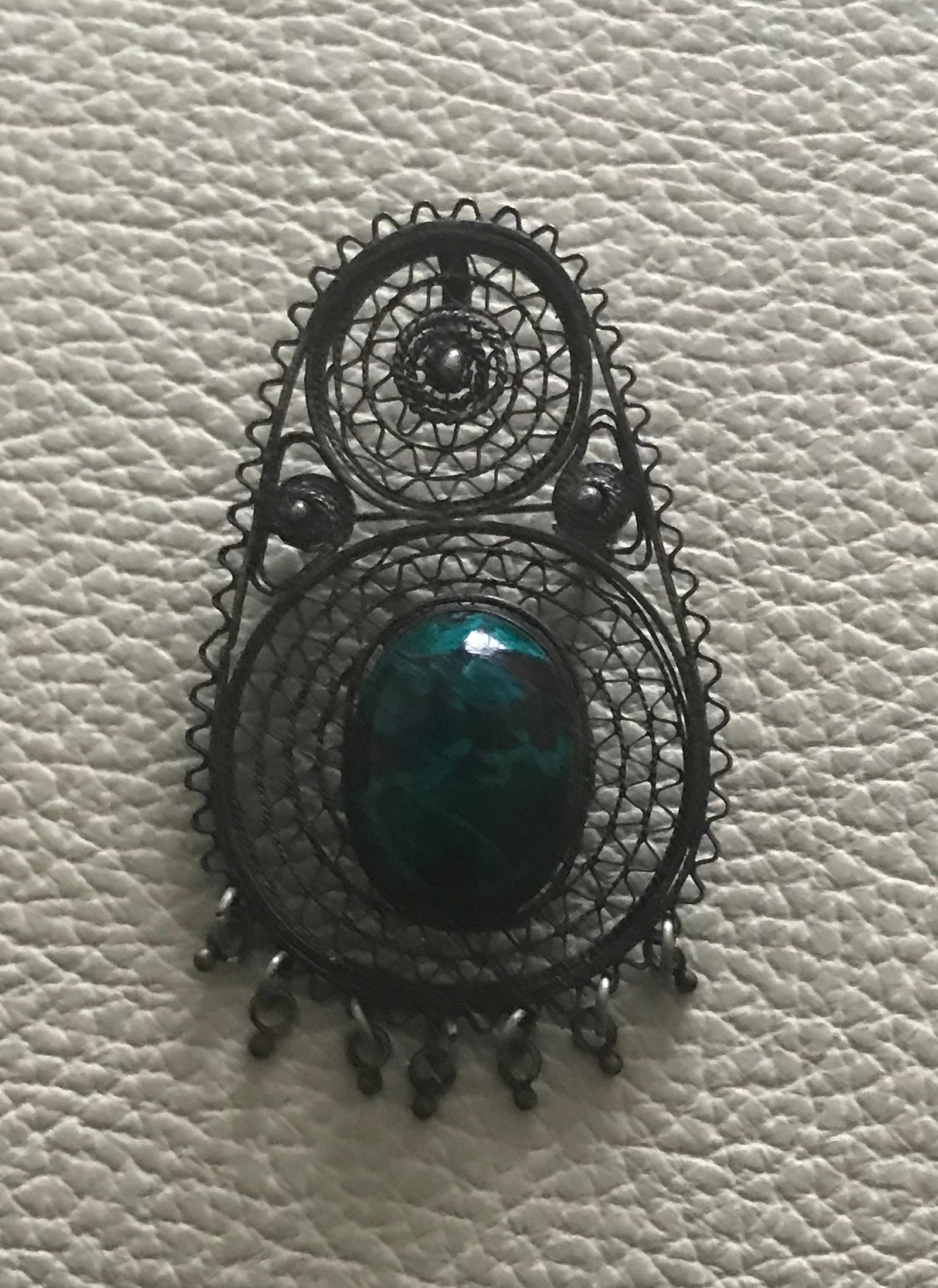 Israel Vintage Sterling Silver filigree w/ Dangles Pendant or Brooch Pin: Title: Israel Vintage Sterling Silver filigree w/ Dangles Pendant or Brooch Pin Description: Vintage Silver Dual Pendant Brooch Set With A Green Stone. Unable to read any markings on this. Please