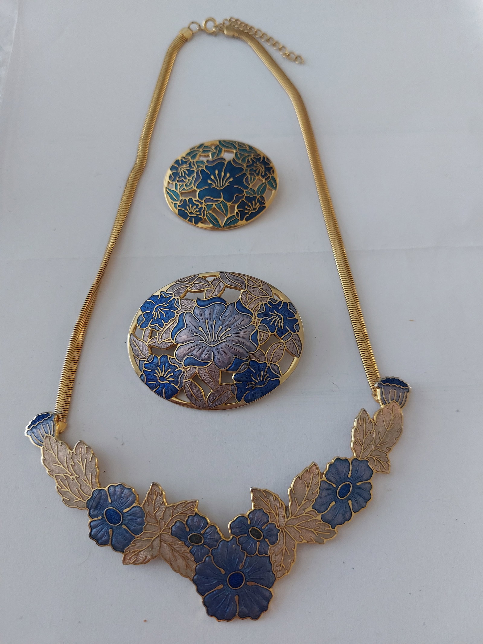 Crown and Fish Jewellery Set - 5 Pieces: Title: Crown and Fish Jewellery Set - 5 Pieces Description: Crown and fish designer jewellery. Worn but in very good condition Necklace, 2 different sized brooches and earrings