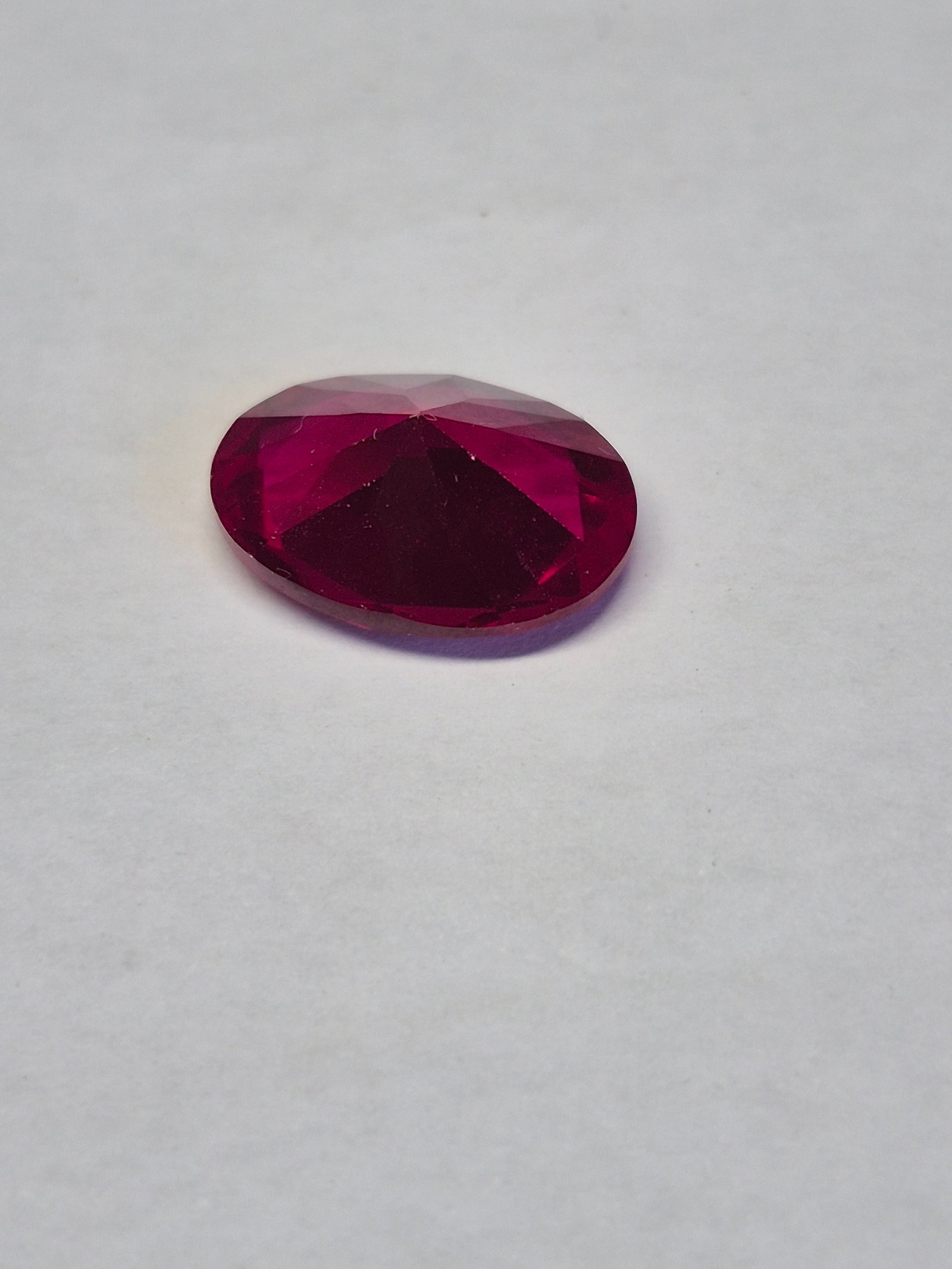 Natural Ruby Corundum Gemstone 6.63 Ct Oval Cut 14 x 10 mm Loose Stone: Title: Natural Ruby Corundum Gemstone 6.63 Ct Oval Cut 14 x 10 mm Loose Stone Description: Beautiful natural ruby corundum gemstone displaying a rich deep red color and excellent brilliance. <