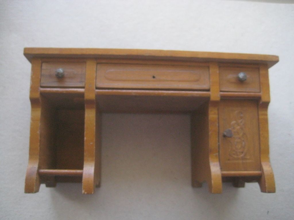 Vintage Dolls House Wooden Sideboard: Title: Vintage Dolls House Wooden Sideboard Description: Vintage Dolls House Wooden Sideboard. Height is 8cm. Condition: Used. One of the metal knobs is missing from the top drawer. Condition: