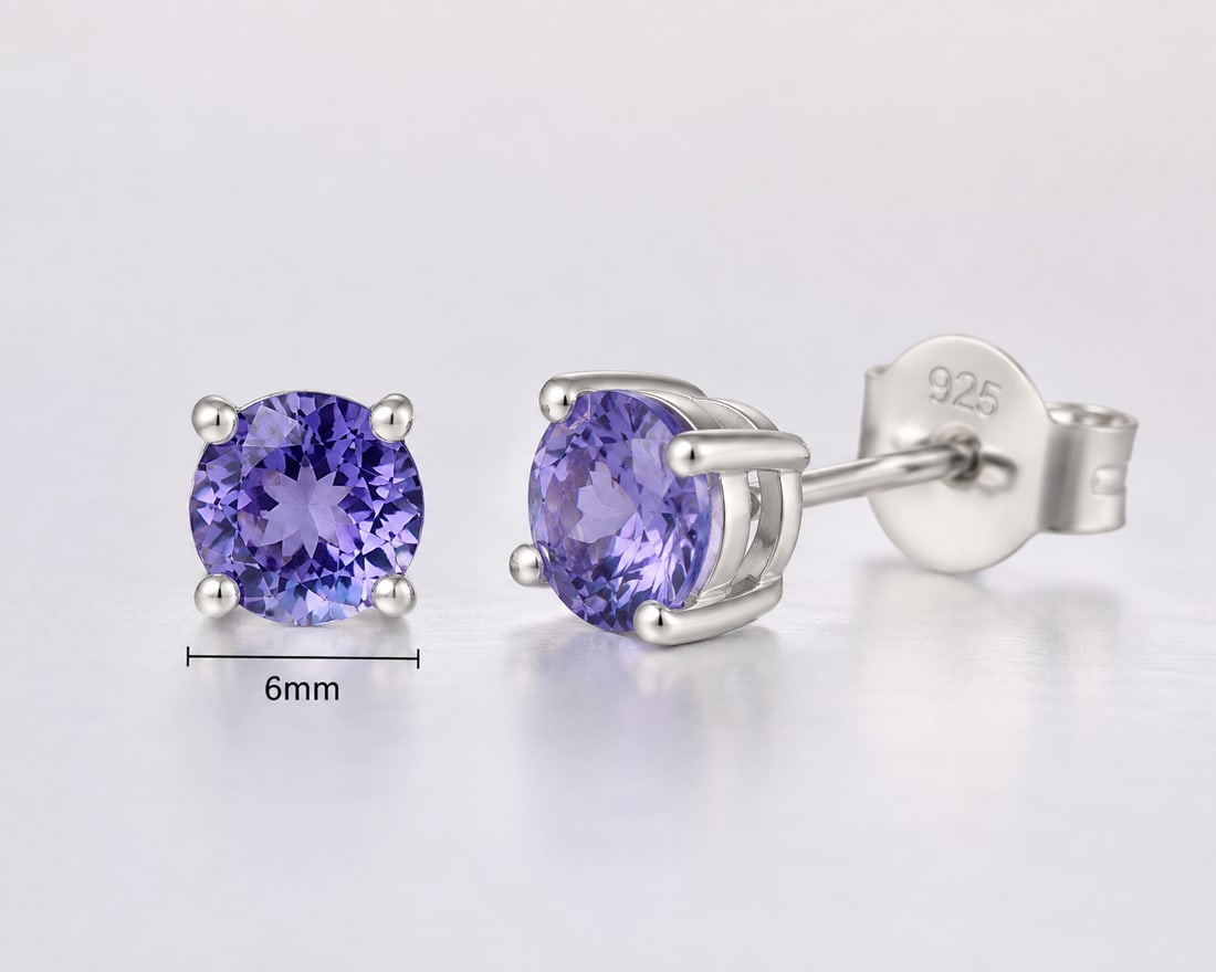 Natural Iolite Stud Earrings 6mm – Sterling Silver 925 Four-Prong Setting: Title: Natural Iolite Stud Earrings 6mm – Sterling Silver 925 Four-Prong Setting Description: Elegant and timeless stud earrings featuring two natural 6mm round iolite gemstones set in solid