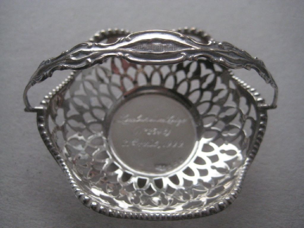Antique Silver Sweetmeat Basket, Birmingham 1908: Title: Antique Silver Sweetmeat Basket, Birmingham 1908 Description: Antique Silver Sweetmeat Basket. The piece is engraved with the inscription "Lombardian Lodge No 2348, 21st April 1909" on